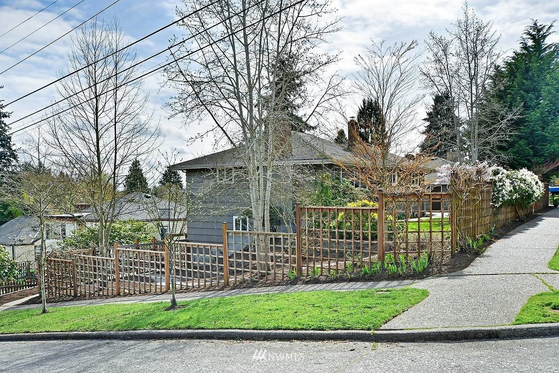 8202 37th Avenue Southwest Seattle, WA 98126 - Photo 27 of 27 a view of a chair and a tree in the background