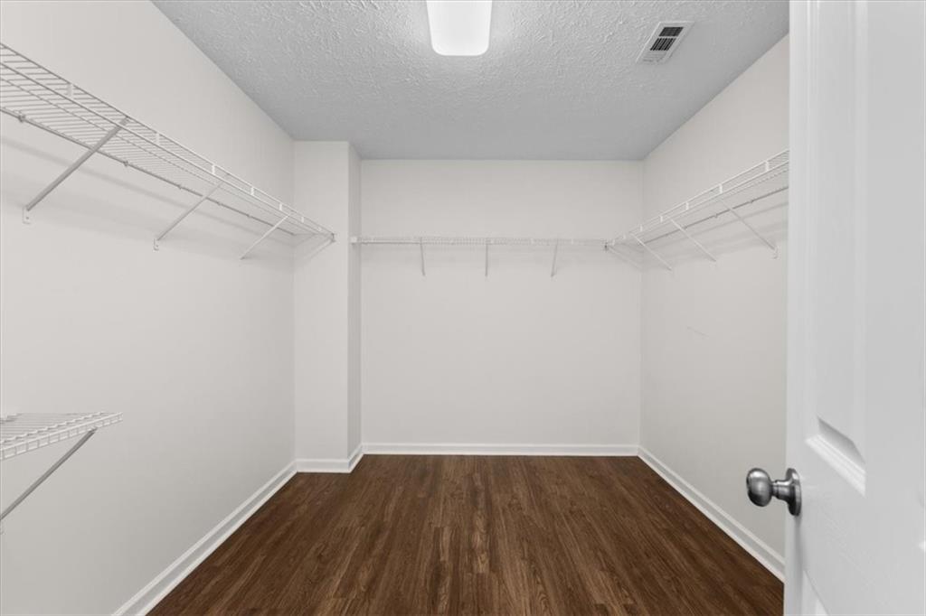 2068 White Top Road Southeast Lawrenceville, GA 30045 - Photo 28 of 41 a view of a room with wooden floor