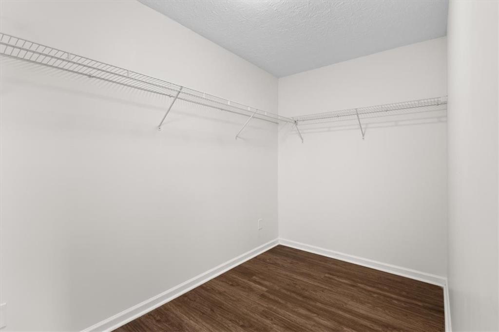 2068 White Top Road Southeast Lawrenceville, GA 30045 - Photo 32 of 41 a view of a room with wooden floor