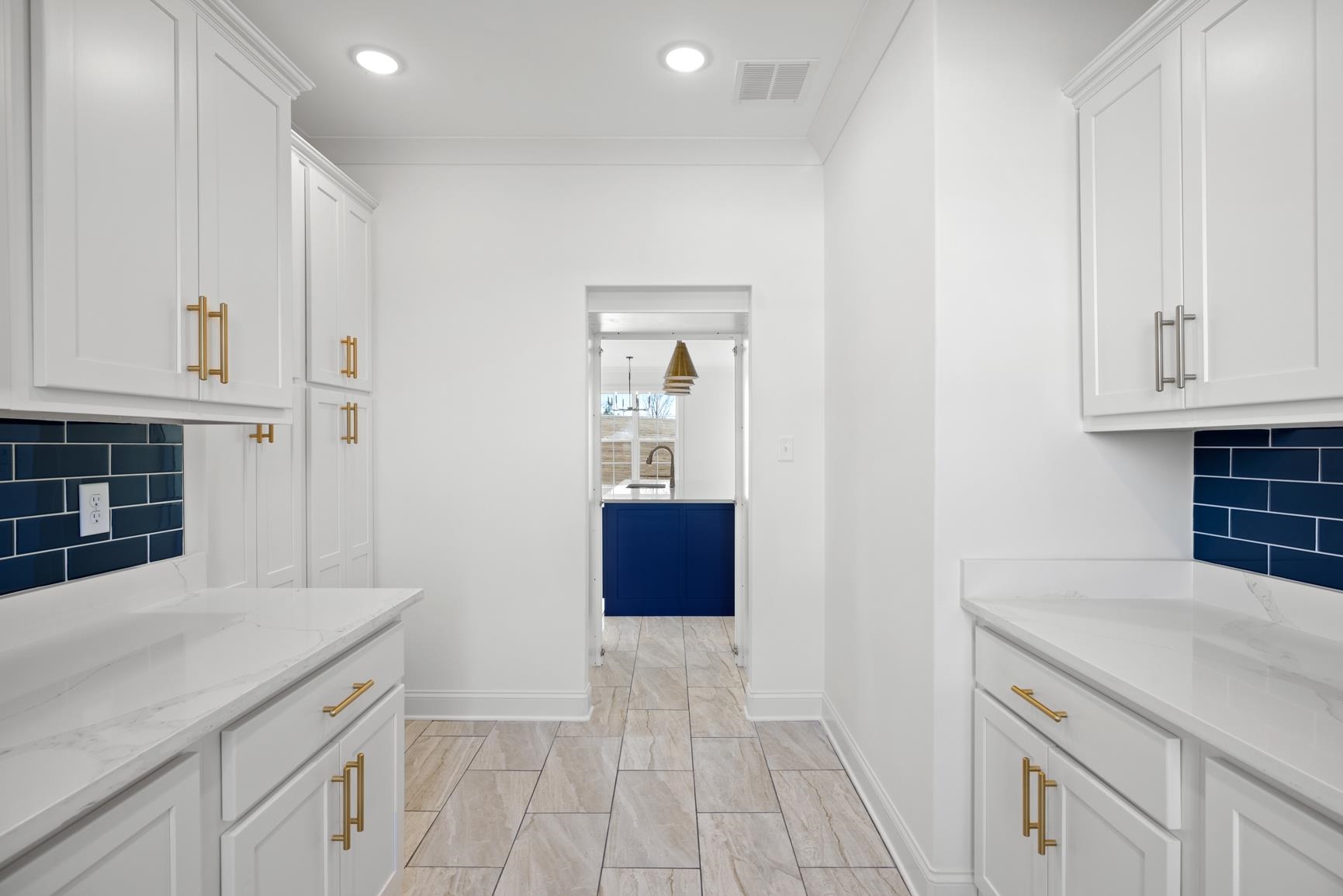 822 Leta Loop Brighton, TN 38011 - Photo 20 of 40 a kitchen with granite countertop white cabinets and stainless steel appliances