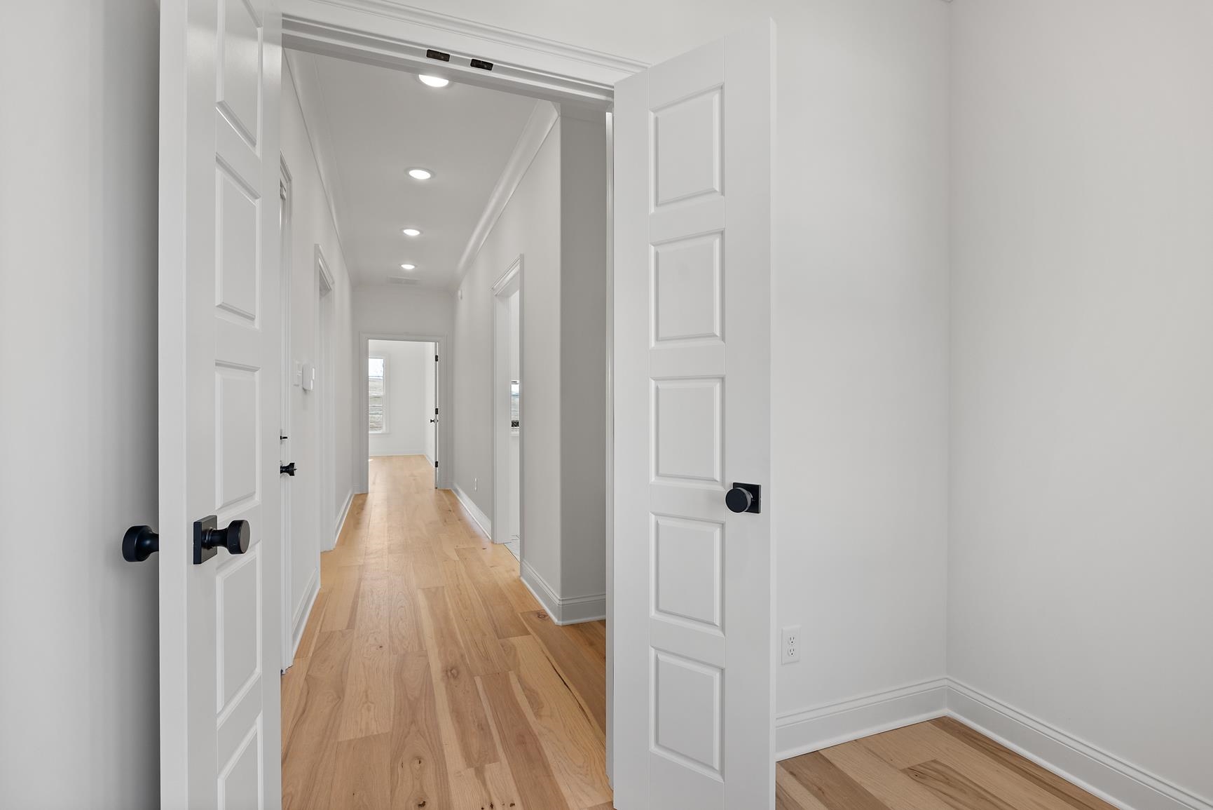 822 Leta Loop Brighton, TN 38011 - Photo 23 of 40 a view of a hallway with wooden floor and staircase