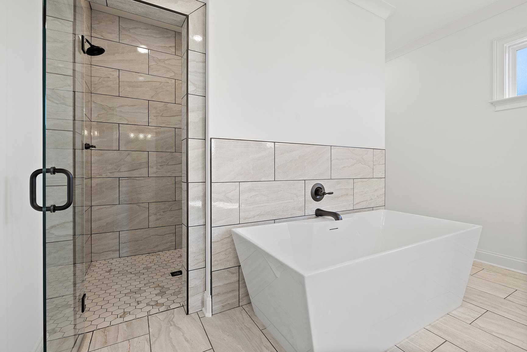 822 Leta Loop Brighton, TN 38011 - Photo 28 of 40 a bathroom with a bathtub and shower