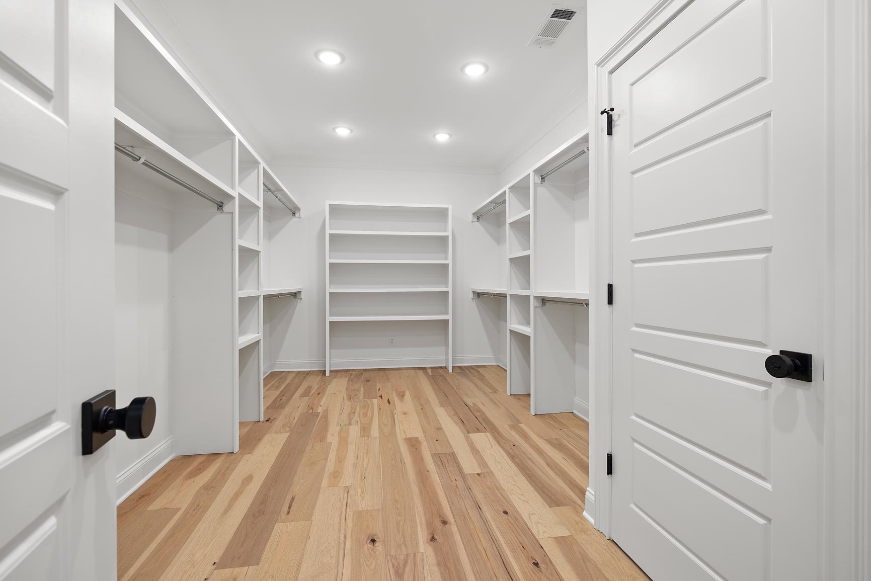 822 Leta Loop Brighton, TN 38011 - Photo 30 of 40 a view of walk in closet with empty racks