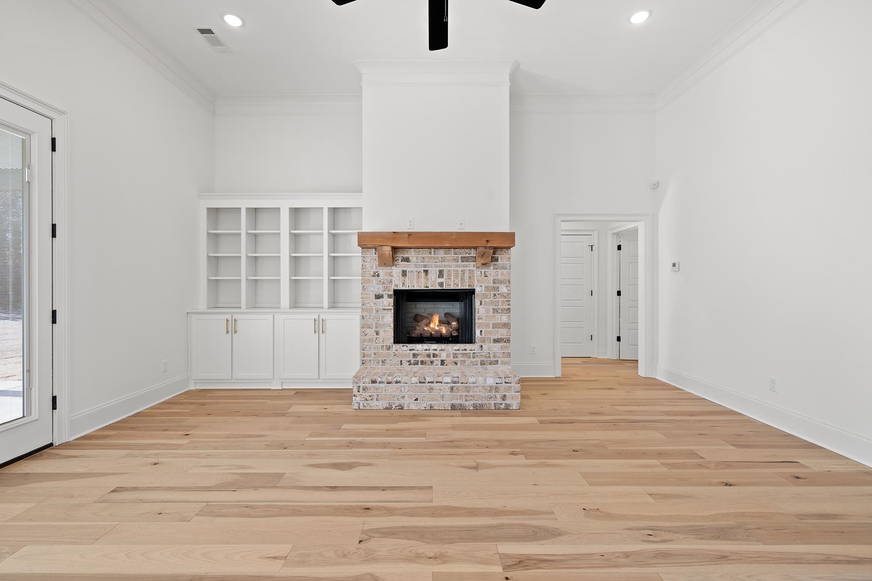 822 Leta Loop Brighton, TN 38011 - Photo 7 of 40 a view of an empty room with a fireplace