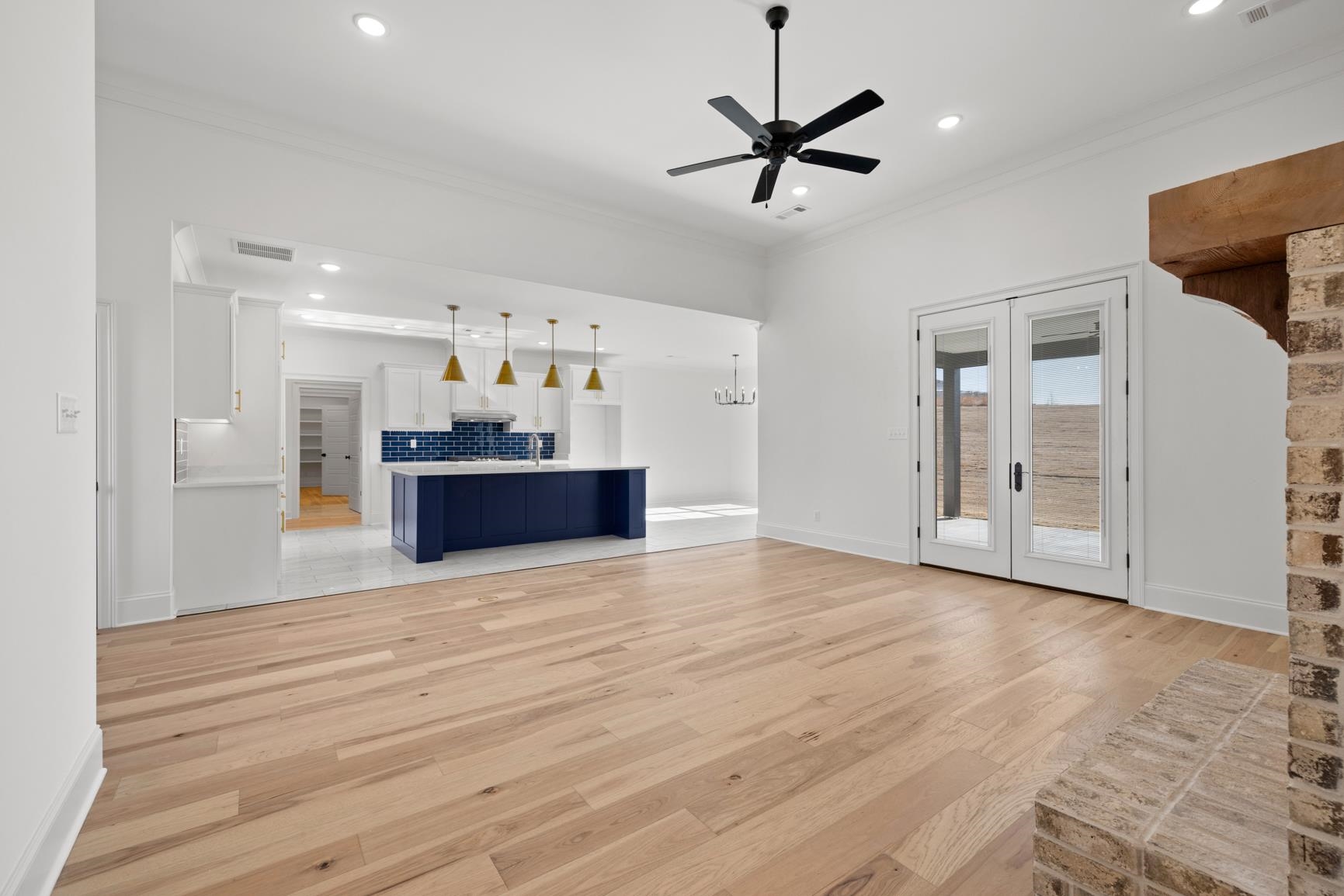 822 Leta Loop Brighton, TN 38011 - Photo 9 of 40 a view of a kitchen with a sink and a chandelier