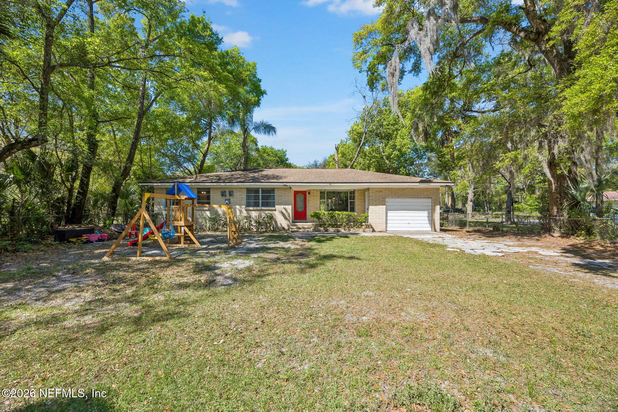 5136 Eulace Road Jacksonville, FL 32210 - Photo 2 of 41 a view of house with outdoor space and swimming pool