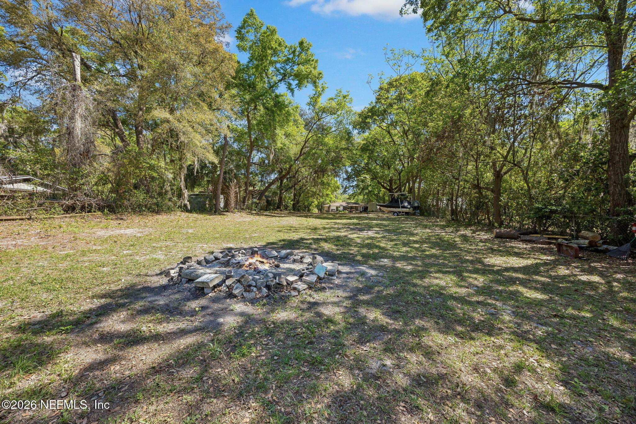 5136 Eulace Road Jacksonville, FL 32210 - Photo 32 of 41 a view of a field with trees
