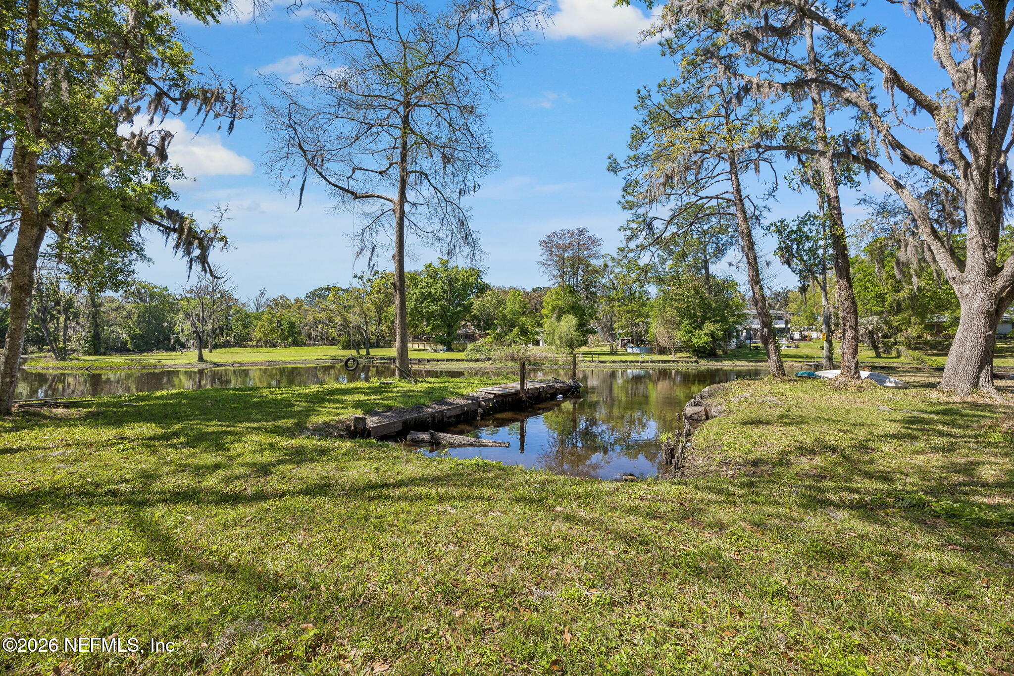 5136 Eulace Road Jacksonville, FL 32210 - Photo 34 of 41 a view of a park with large trees