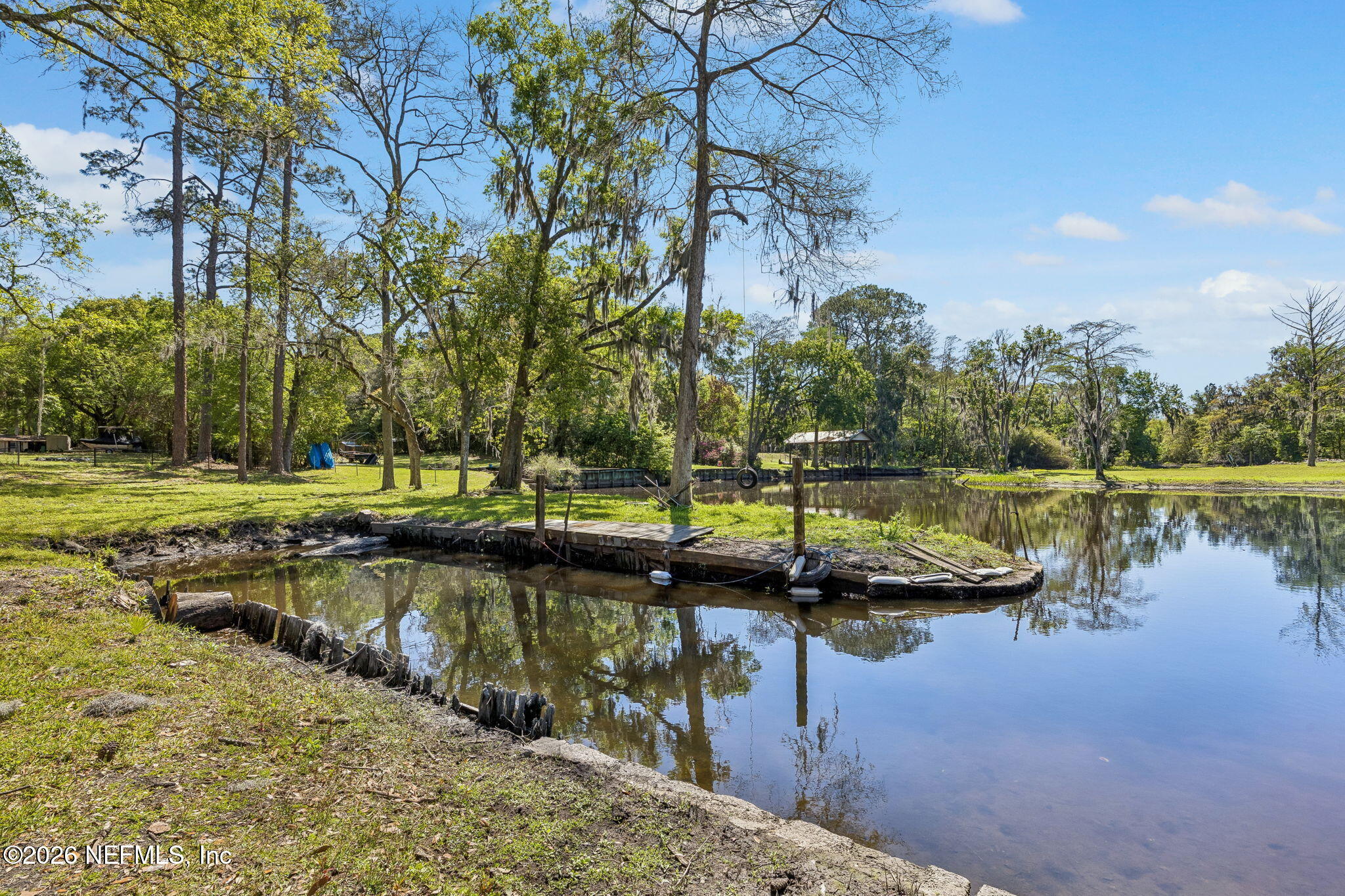 5136 Eulace Road Jacksonville, FL 32210 - Photo 35 of 41 a view of a lake with houses