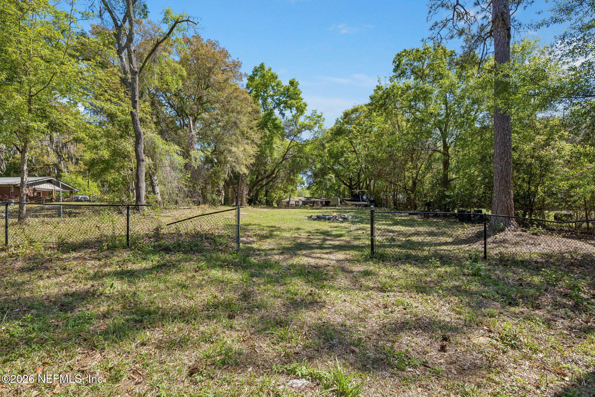 5136 Eulace Road Jacksonville, FL 32210 - Photo 38 of 41 a view of a field with trees