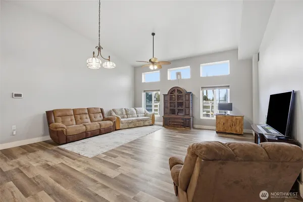 a kitchen with a table and chairs in it