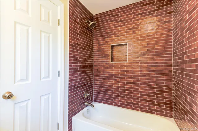 a bathroom with a bathtub