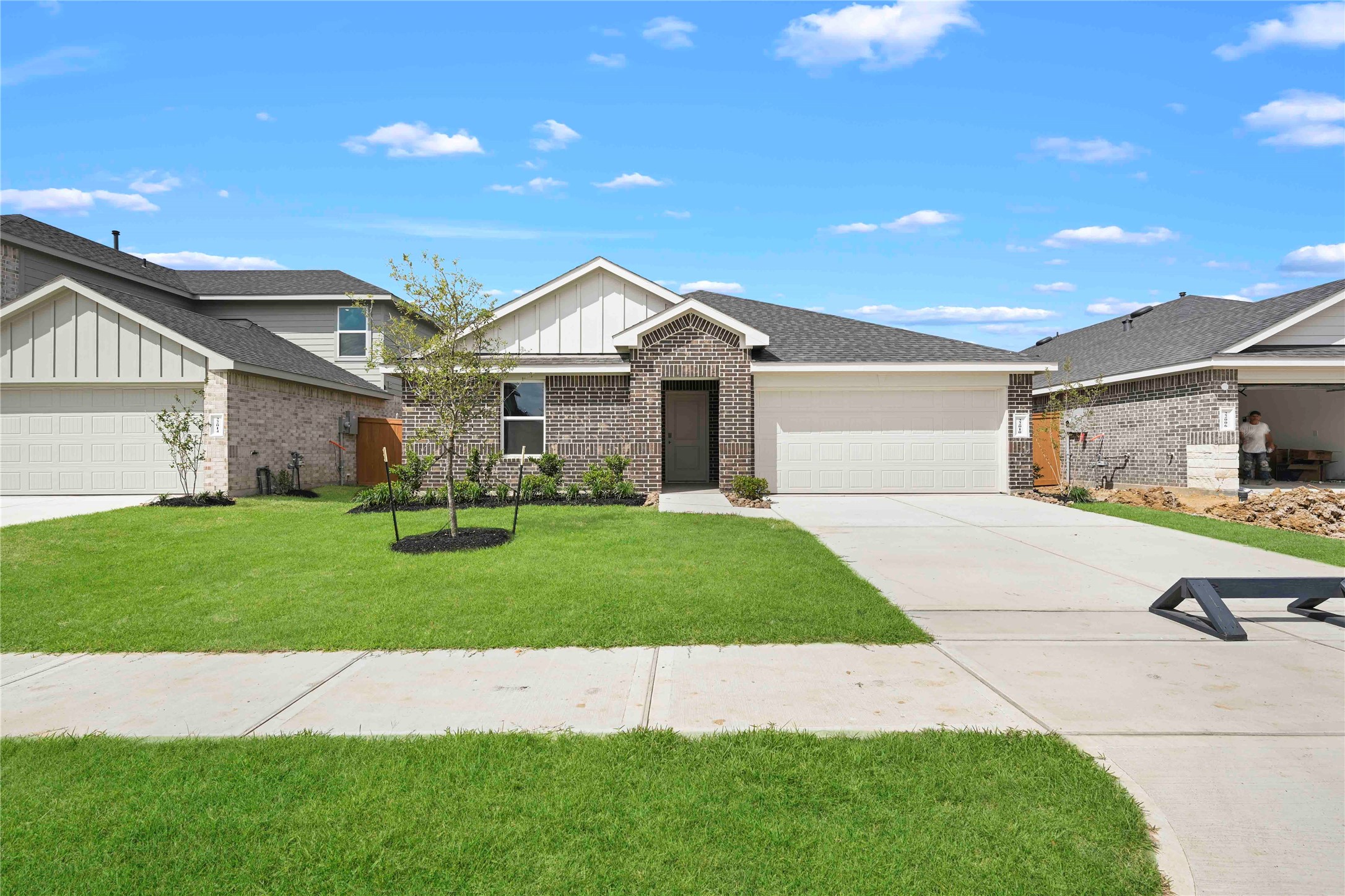 22010 Vernazza Bend Hockley, TX 77447 - Photo 1 of 36 a front view of a house with a yard and garage