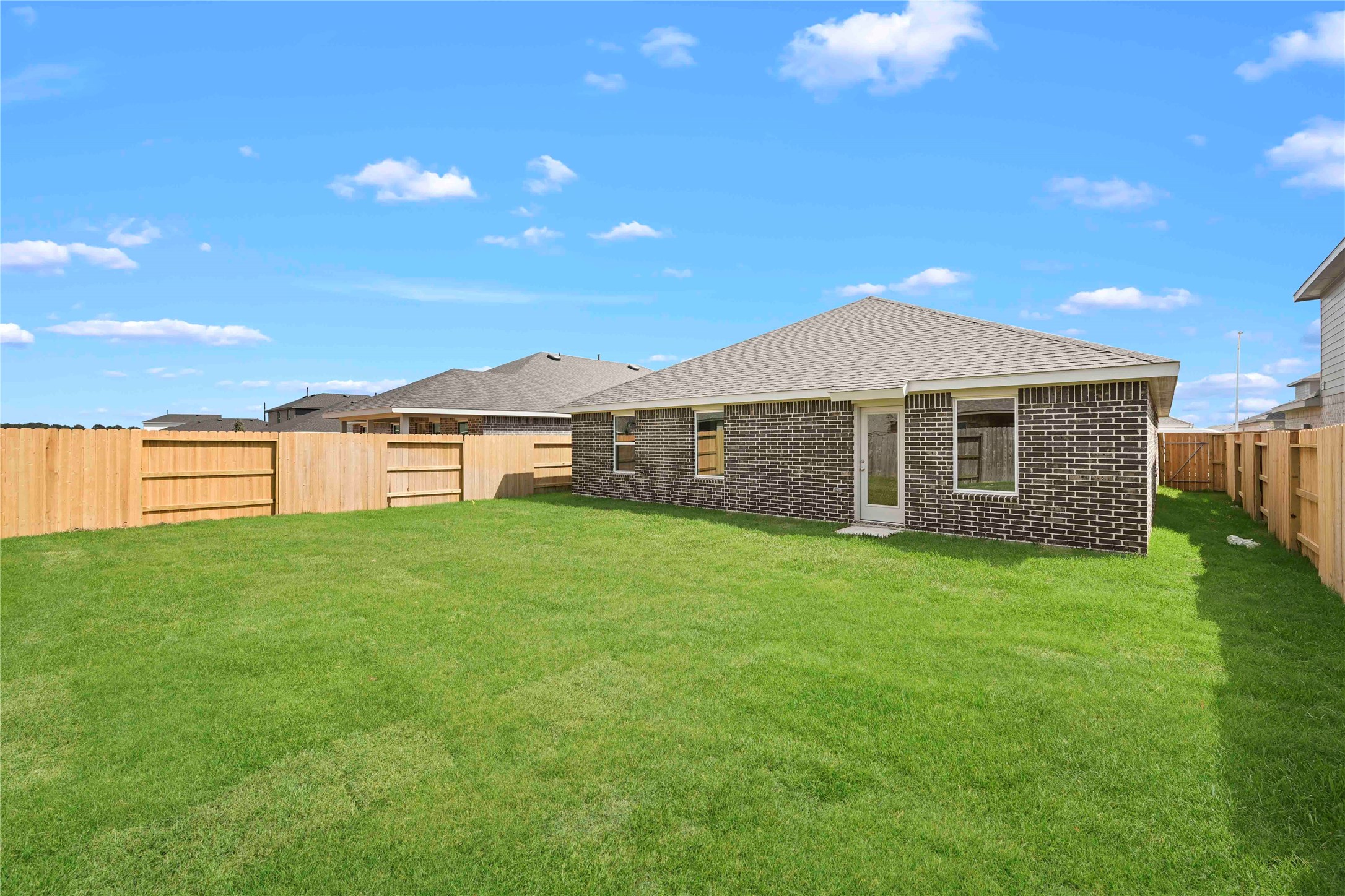 22010 Vernazza Bend Hockley, TX 77447 - Photo 17 of 36 a view of a yard with an outdoor space