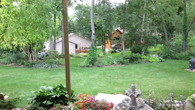 2029 Hillsdown Road Lake Summerset, IL 61019 - Photo 23 of 24 a backyard of a house with lots of green space and outdoor seating