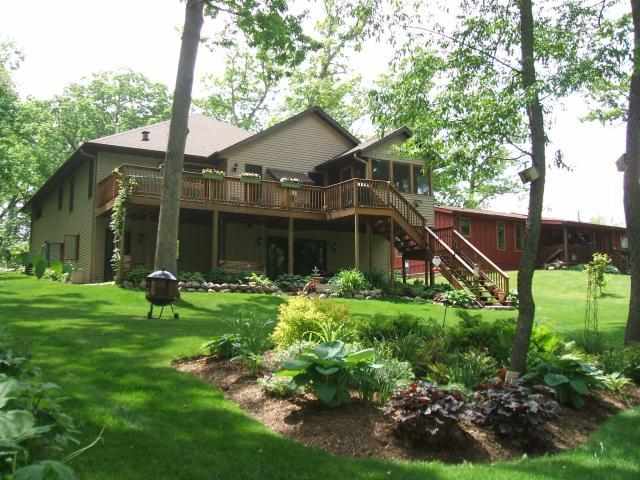 2029 Hillsdown Road Lake Summerset, IL 61019 - Photo 24 of 24 a front view of a house with garden