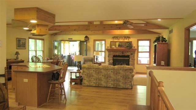 2029 Hillsdown Road Lake Summerset, IL 61019 - Photo 4 of 24 a living room with fireplace furniture and a chandelier
