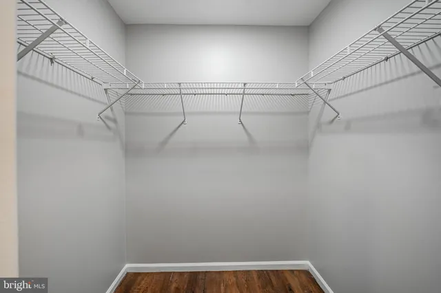 a view of a room with racks on the wall