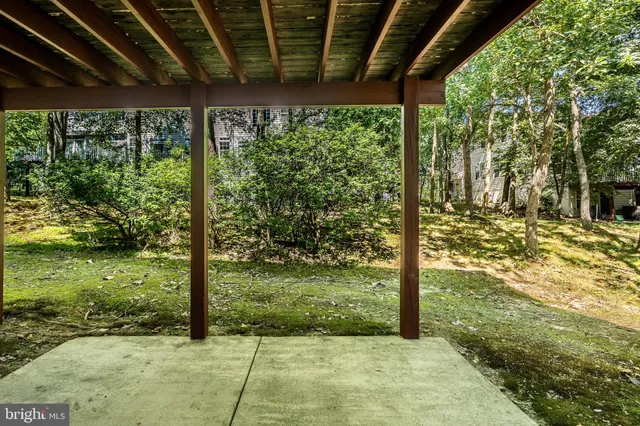 a view of a backyard of the house