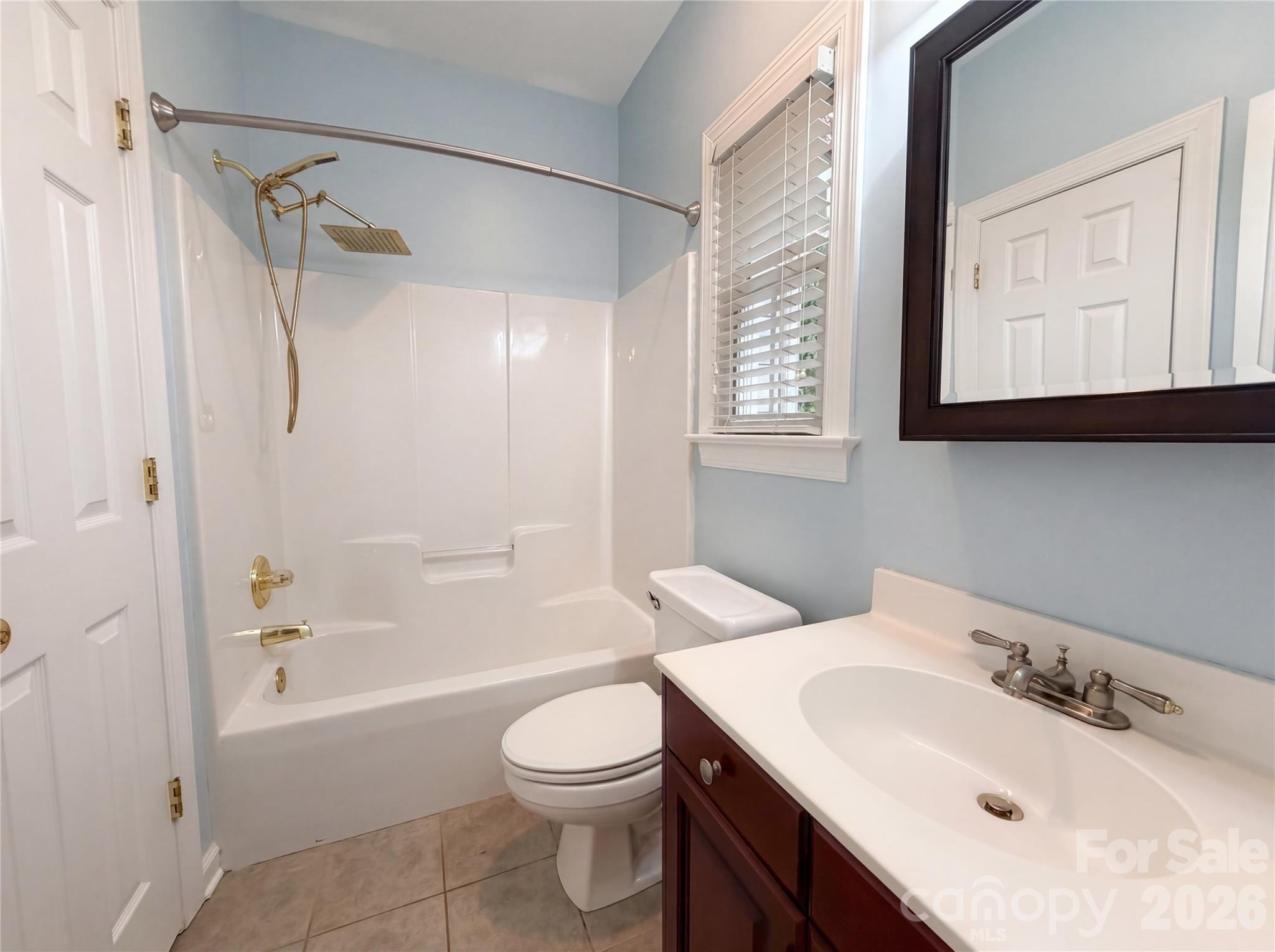 12341 Willingdon Road Huntersville, NC 28078 - Photo 13 of 17 a bathroom with a sink toilet and shower