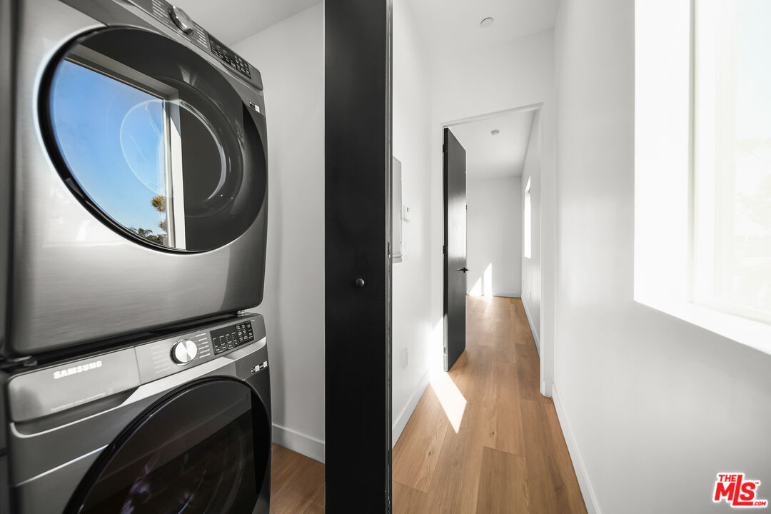 1905 South Corning Street, Unit 2 Los Angeles, CA 90034 - Photo 18 of 26 a view of a hallway with washer and dryer