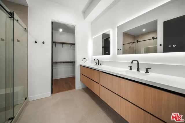 a view of a sink and cabinets