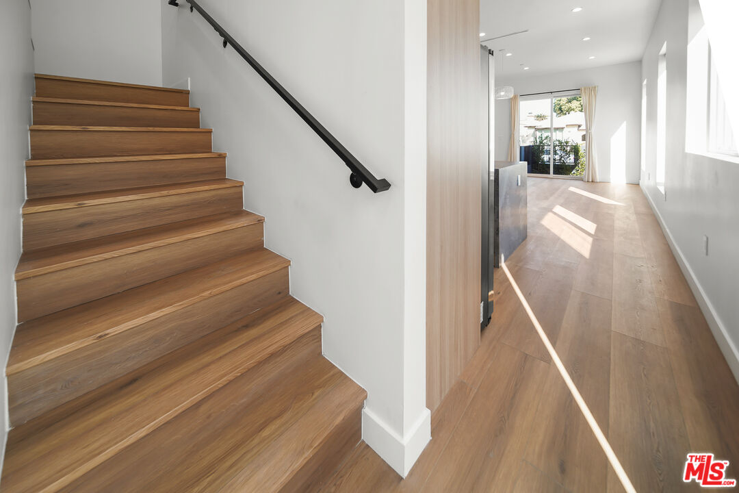 1905 South Corning Street, Unit 2 Los Angeles, CA 90034 - Photo 7 of 26 a view of entryway and hall with wooden floor