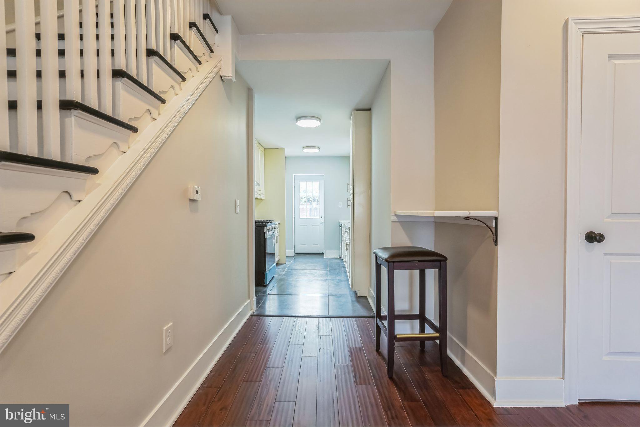 2020 East Cumberland Street Philadelphia, PA 19125 - Photo 11 of 36 a view of a hallway with wooden floor and staircase