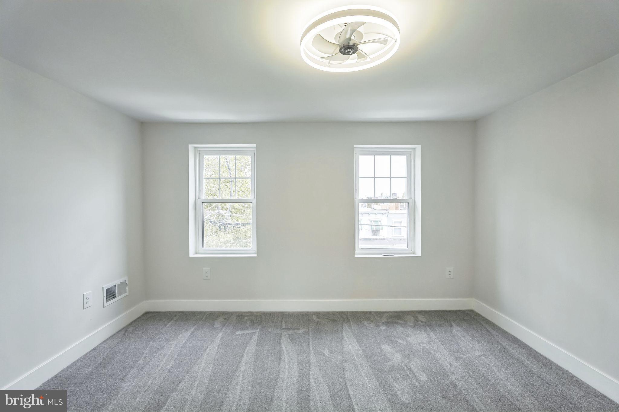 2020 East Cumberland Street Philadelphia, PA 19125 - Photo 26 of 36 an empty room with a window