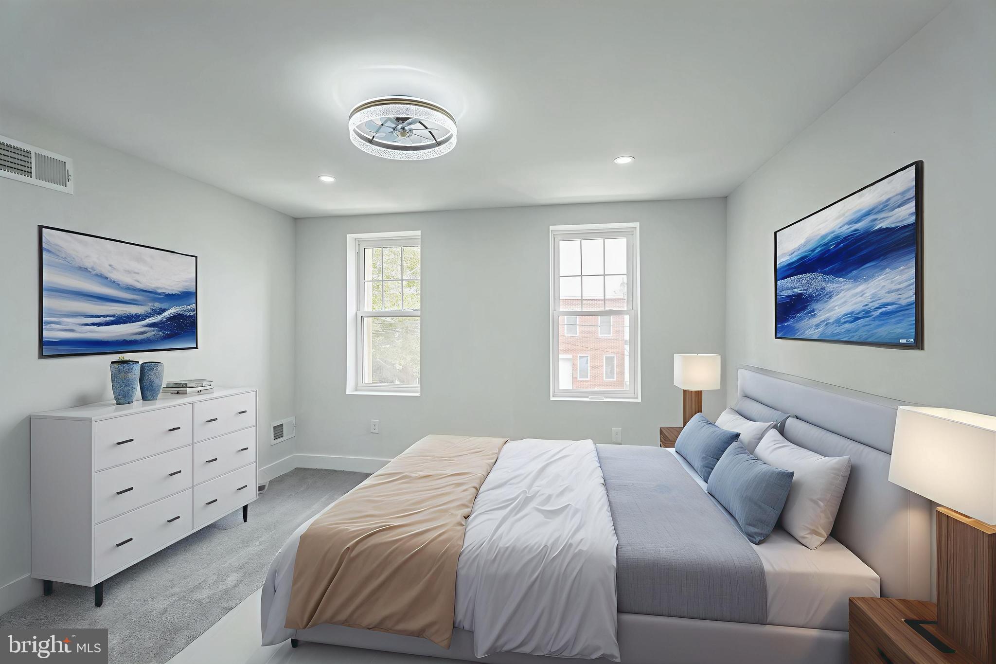 2020 East Cumberland Street Philadelphia, PA 19125 - Photo 29 of 36 a bedroom with a bed and painting on the wall