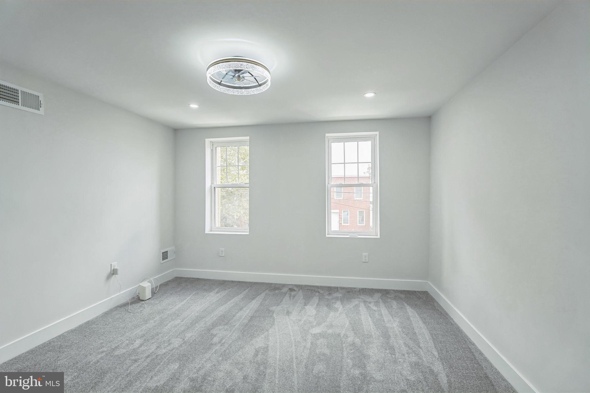 2020 East Cumberland Street Philadelphia, PA 19125 - Photo 30 of 36 an empty room with a window