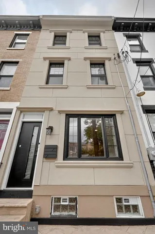 a view of building with large windows