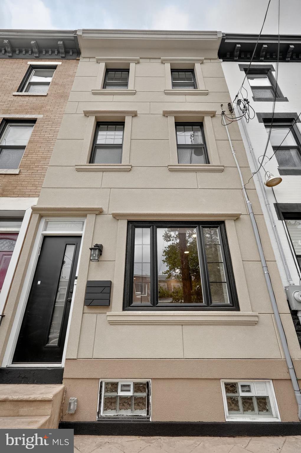 2020 East Cumberland Street Philadelphia, PA 19125 - Photo 3 of 36 a view of building with large windows