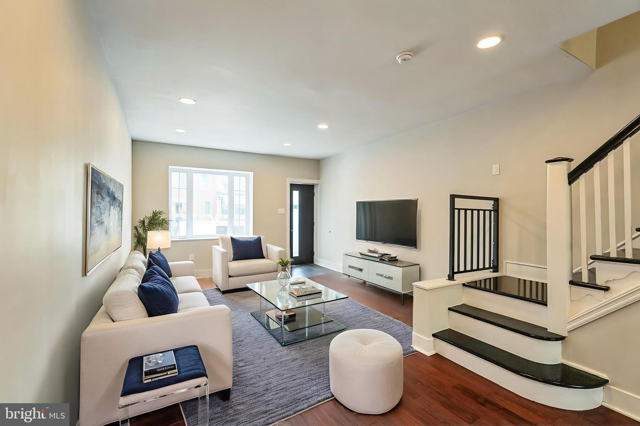 2020 East Cumberland Street Philadelphia, PA 19125 - Photo 6 of 36 a living room with furniture and a flat screen tv