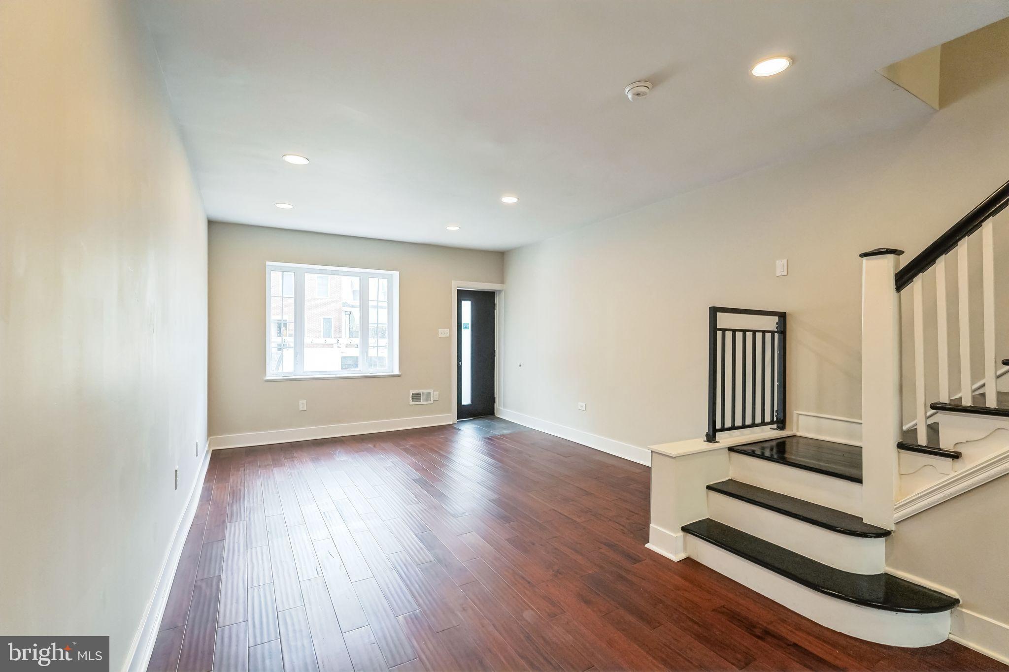 2020 East Cumberland Street Philadelphia, PA 19125 - Photo 7 of 36 wooden floor in an empty room with a window