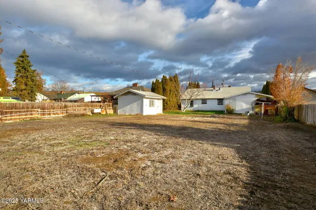 a view of a street with houses