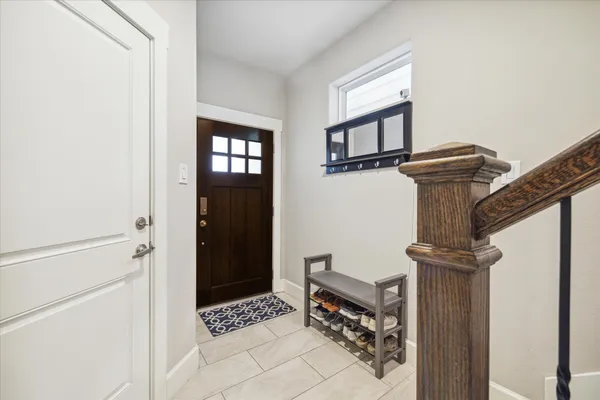 a view of entryway with a front door