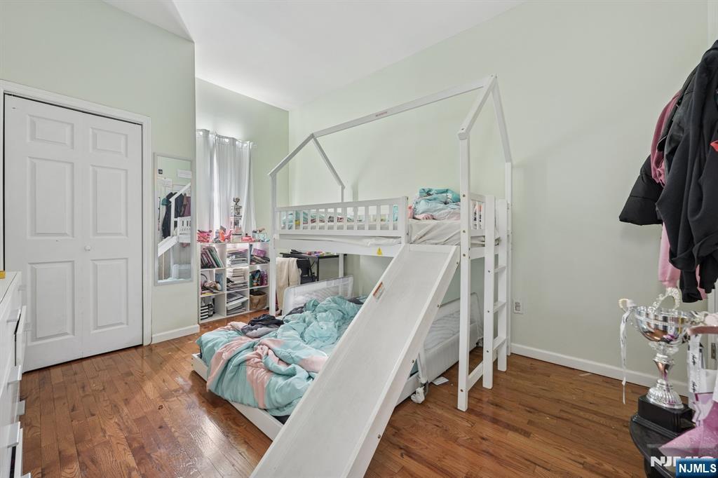717 16th Street Union City, NJ 07087 - Photo 16 of 27 a view of a room with furniture and wooden floor