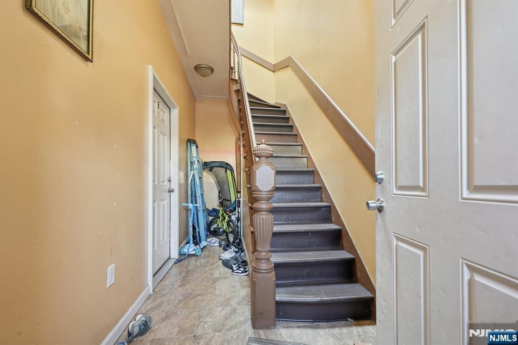 717 16th Street Union City, NJ 07087 - Photo 19 of 27 a view of entryway and gallery with wooden floor