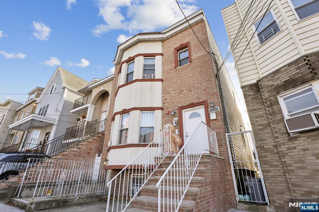717 16th Street Union City, NJ 07087 - Photo 2 of 27 front view of a building