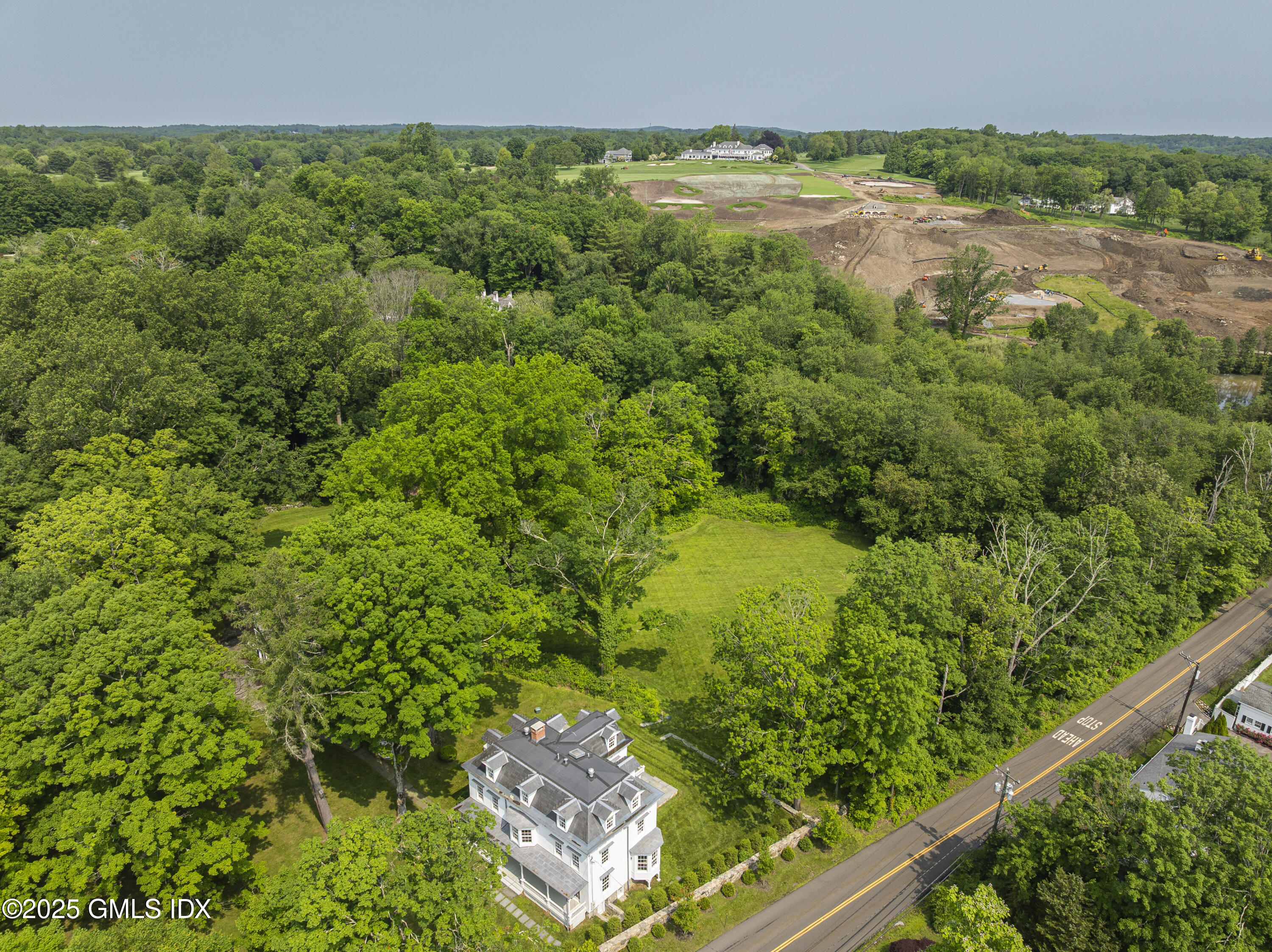 295 Taconic Road Greenwich, CT 06831 - Photo 26 of 35 a view of a garden with an outdoor space