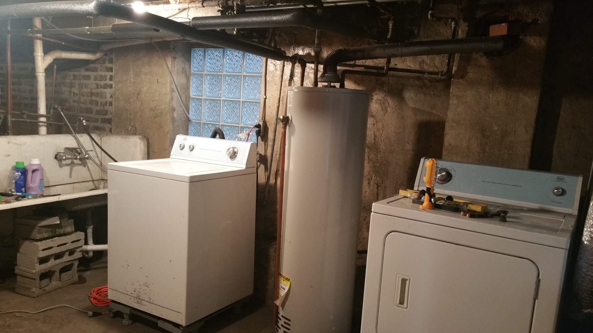 1309 West Fillmore Street, Unit 1 Chicago, IL 60607 - Photo 7 of 9 a utility room with dryer and washer