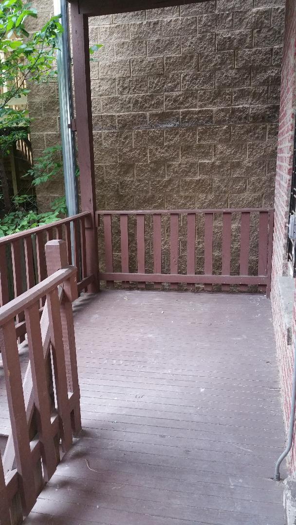 1309 West Fillmore Street, Unit 1 Chicago, IL 60607 - Photo 8 of 9 a view of wooden balcony