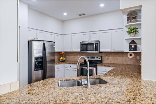 $565,000 | 105 Santiago Drive, Unit 102, Jupiter, FL 33458
