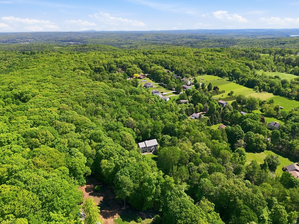 345 Bragg Road Warren, MA 01585 - Photo 40 of 41 a view of a big yard with lots of green space