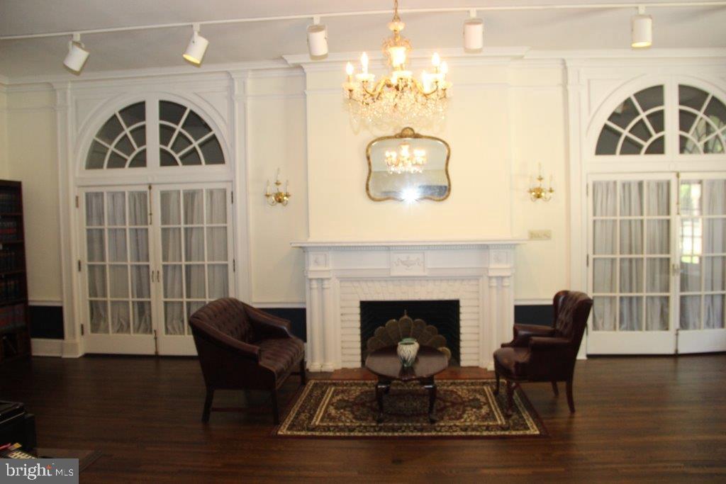 1720 Mineral Spring Road Reading, PA 19602 - Photo 14 of 26 a living room with furniture and a fireplace