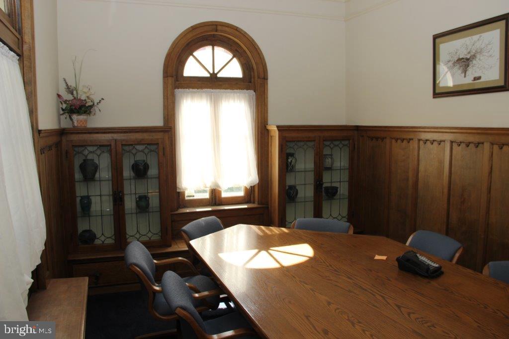 1720 Mineral Spring Road Reading, PA 19602 - Photo 17 of 26 a room with furniture and window