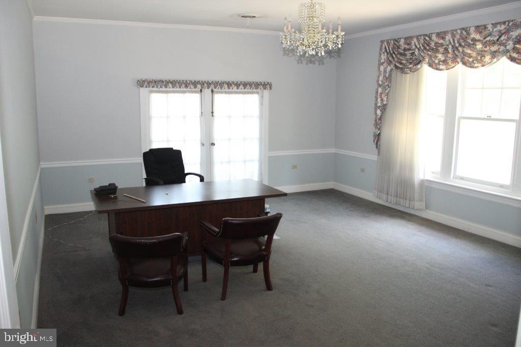 1720 Mineral Spring Road Reading, PA 19602 - Photo 24 of 26 a workspace with furniture and a window
