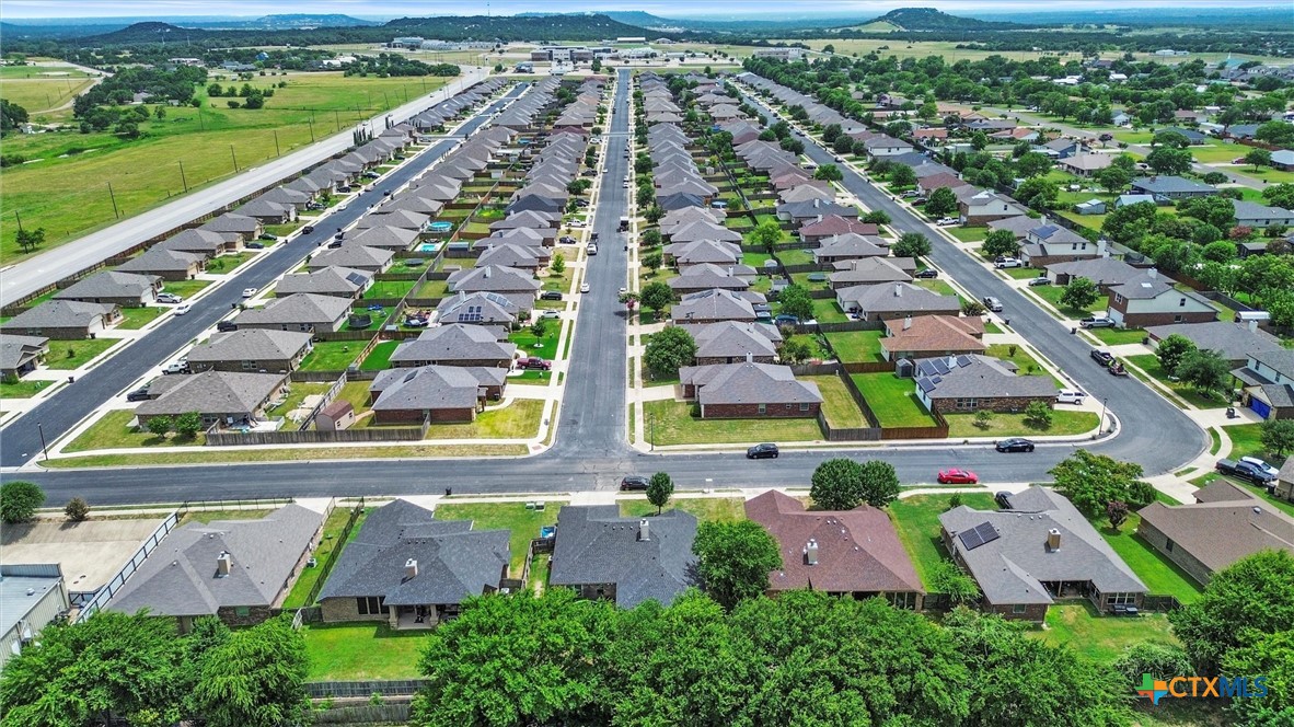 6405 Deorsam Loop Killeen, TX 76542 - Photo 33 of 36 an aerial view of multiple houses with yard