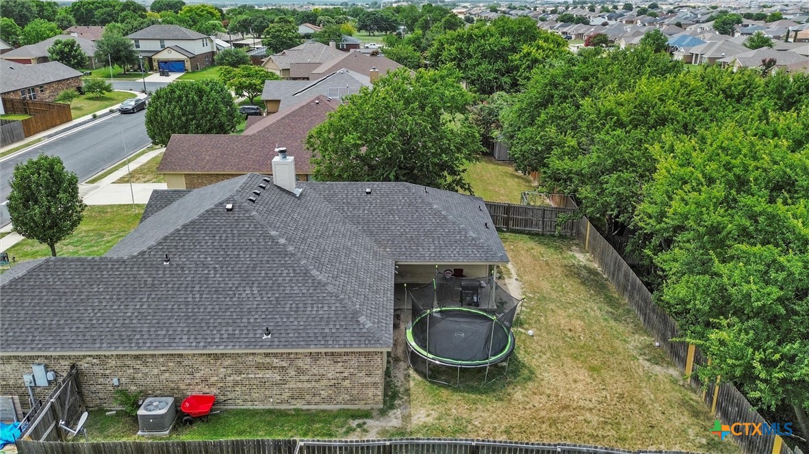 6405 Deorsam Loop Killeen, TX 76542 - Photo 36 of 36 a backyard of a house with outdoor seating